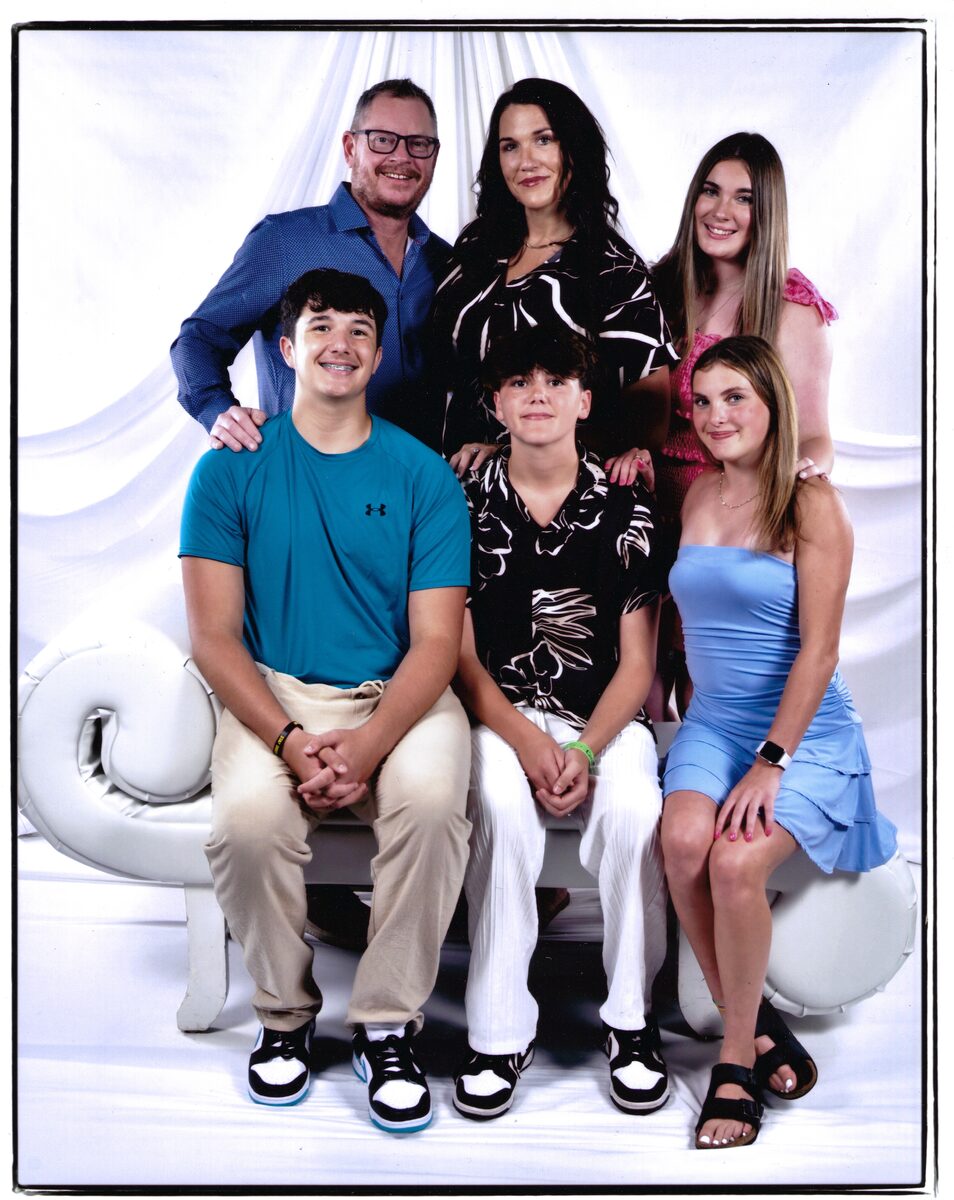 The LiveWire family — owner Jay Strickland and office manager Megan
